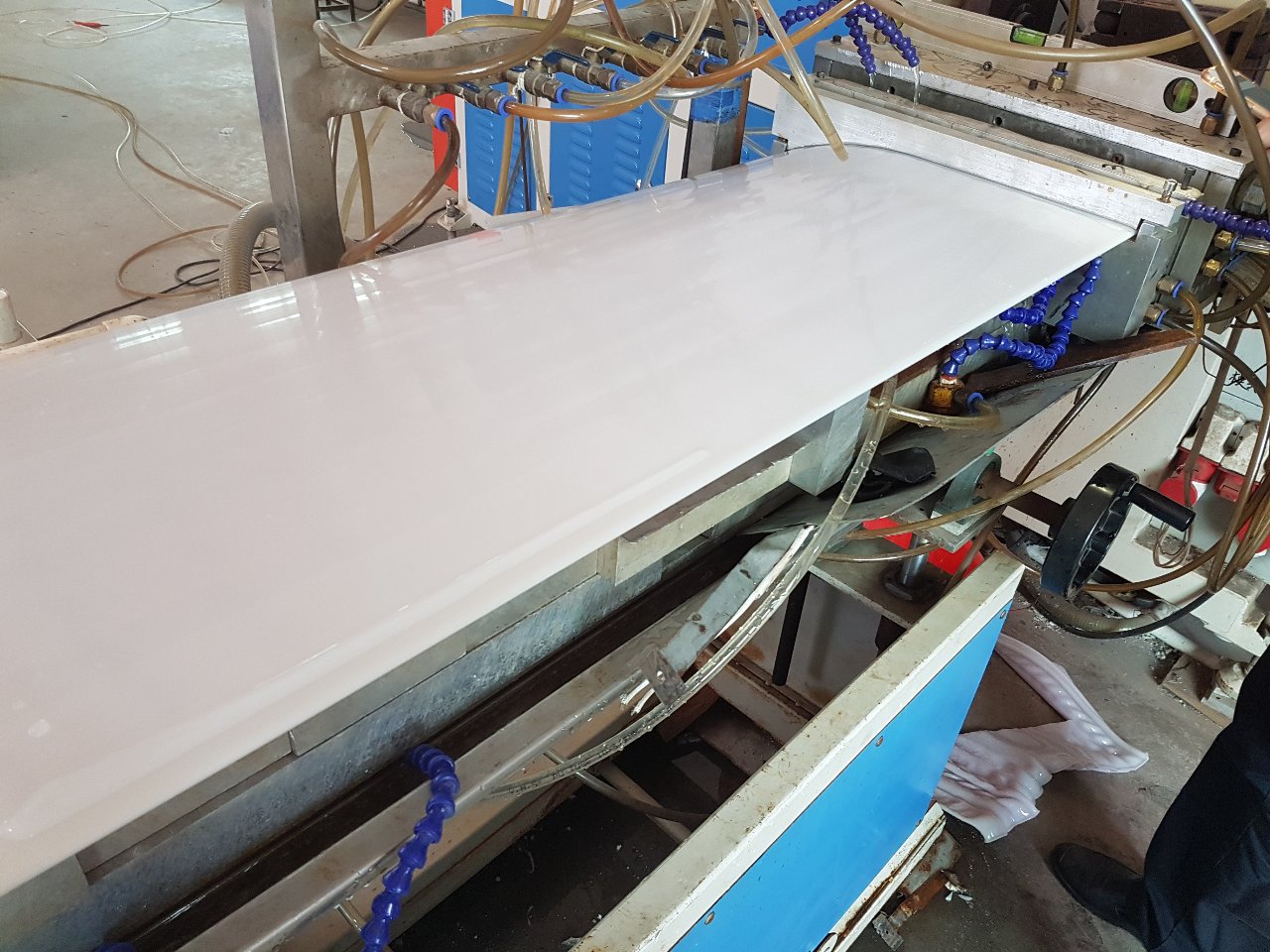 A custom cabinet door being manufactured.