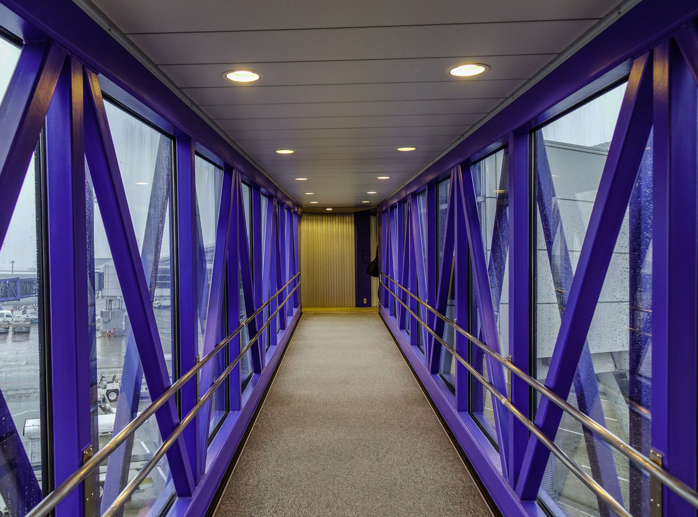 An airport passenger boarding bridge with energy efficient lighting.
